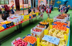 Distribution of fruit baskets to children in Deir al-Balah, supported by (WCK)