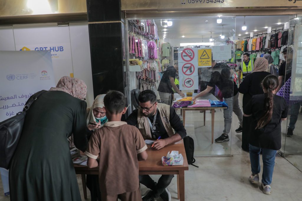 Distribution of clothing vouchers to 1,083 households in northern and southern Gaza Strip, in partnership with (IOM)
