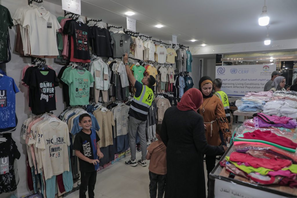 Distribution of clothing vouchers to 1,083 households in northern and southern Gaza Strip, in partnership with (IOM)