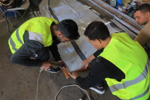 مشروع ترميم 300 منزل للعائلات المتضررة في مناطق شمال غزة بالشراكة مع (IOM)